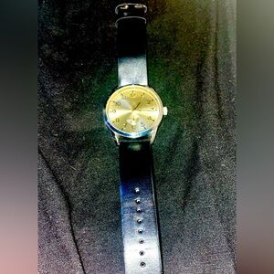 casual stainless steel gold accented quartz movement watch